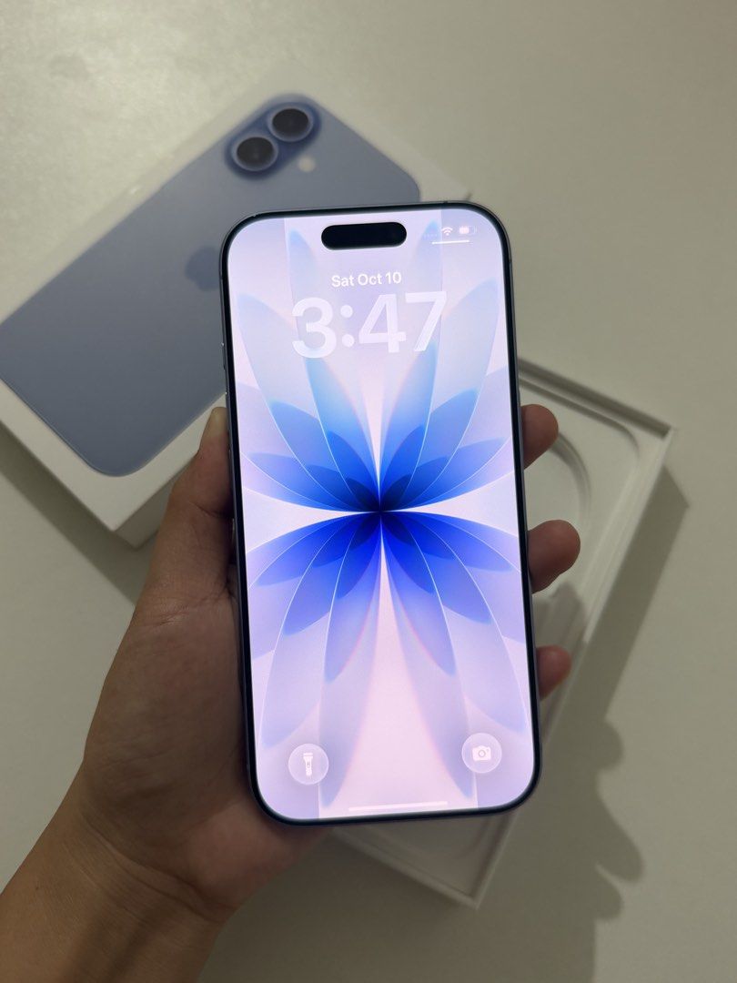 iPhone 17 (Category: iPhone 17 Series) located in San Fernando. Submitted by idistrictph (Listing ID 1467089414, Image 2). Description: iPhone 17 • 256 GB, Mist Blue • 98% BH • No SIM restrictions • X/A Local variant • In pristine condition, no dents and scratches • Underwarranty 'til May 2027 • Complete standard package Selling Price: 43 990 only Open for trade-ins, trade value is higher. DM for inquiries..