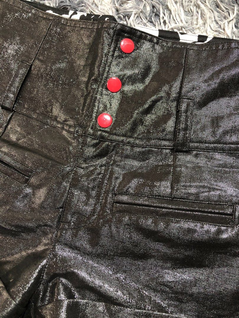 Isabel marant (Category: Luxury Apparel) located in Daraga. Submitted by koko1630 (Listing ID 1466995406, Image 2). Description: Isabel marant high-waisted black metallic or faux-leather mini shorts with pink/red accent buttons. Size 26-28 Good as new .