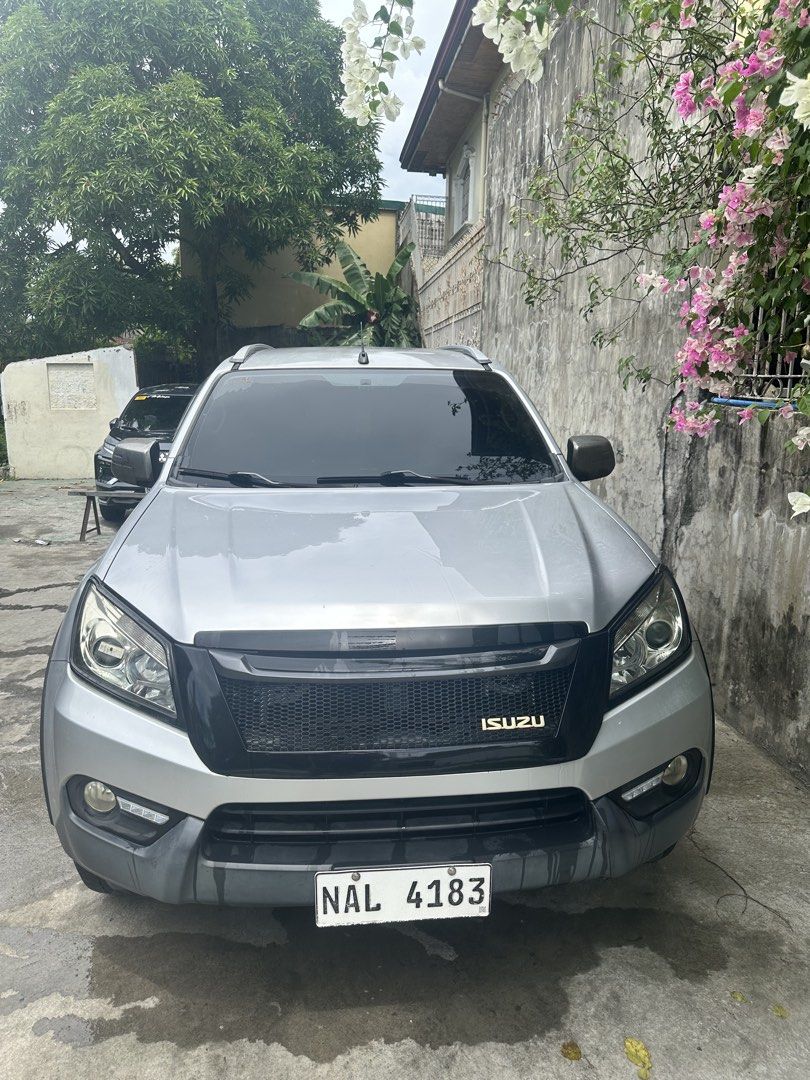 Isuzu Mu-X (Category: Used Cars) located in Manila. Submitted by linomer (Listing ID 1467142311, Image 3). Description: ISUZU MUX 2017 2.5 LS Manual trasmission. 77K Odometer orig mileage Silver metallic Upgrades: OCC worth 7k Front gril worth 10k Foglight with DRL Mags and tires 70K New Tires 2025 DOT bridgestone Venum mags Orig Roofrail Black Spoiler Garnish Side fender Window visor Undercoat last June 2026 Appearance: Some minor scratches plea