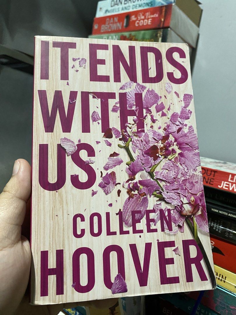 It Ends With Us by Colleen Hoover (Category: Storybooks) located in Tarlac. Submitted by readmylyf (Listing ID 1467107972, Image 1). Description: - Title: It Ends With Us by Colleen Hoover - Format: Paperback edition - Design: Classic wooden texture cover with pink flower petals - Genre: Romance and drama - Condition: Pre-loved, clearing out bookshelf - Perfect addition to your reading list.
