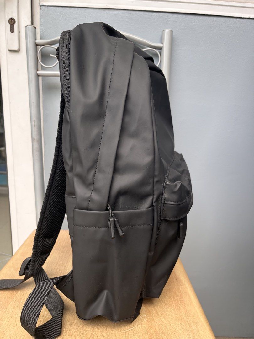 Jack Daniel's Black Waterproof Backpack (Category: Backpacks) located in Pasay City. Submitted by wear.id (Listing ID 1467155977, Image 3). Description: Jack Daniel's Backpack w/ luggage sleeve - color: solid black with smooth matte finish - stitched logo branding on the front pocket - double zipper main compartment and exterior front pouch with clean interior lining - adjustable shoulder straps - brand new / excellent quality.