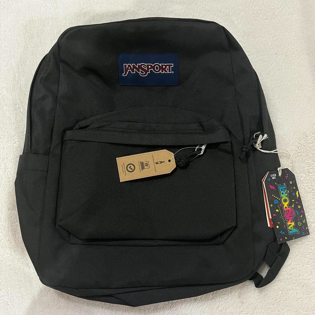 JanSport Backpack Assorted Colors and Patterns Available (Category: Backpacks) located in Mangaldan. Submitted by ice_thrift_hub (Listing ID 1467161909, Image 3). Description: - Authentic JanSport backpacks with original tags attached - Available colors & patterns: Solid purple, neon yellow, black, light grey, and blue/white stripe with banana print - Features a handy front zippered pocket for extra storage - Versatile and durable, great for scho