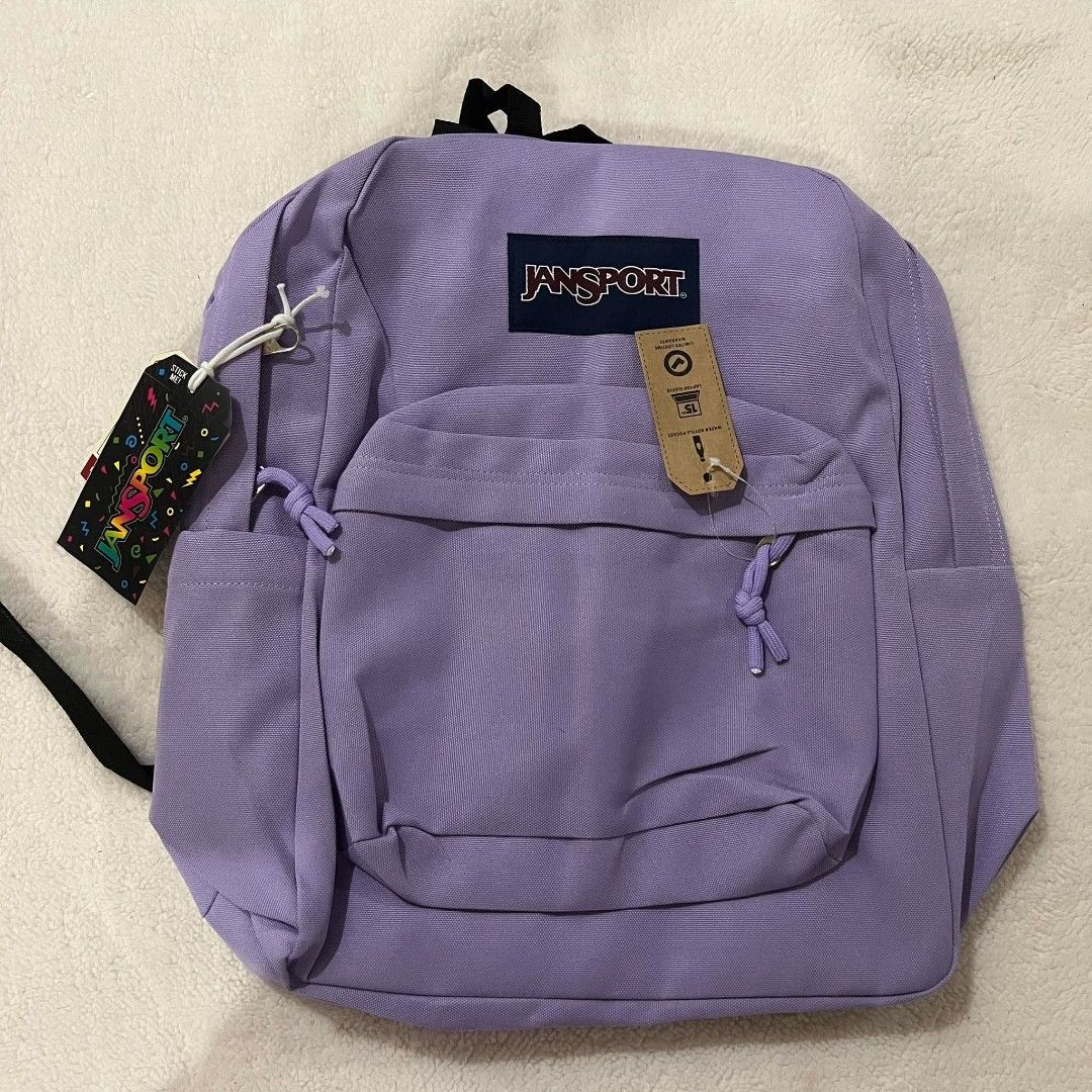 JanSport Backpack Assorted Colors and Patterns Available (Category: Backpacks) located in Mangaldan. Submitted by ice_thrift_hub (Listing ID 1467161909, Image 1). Description: - Authentic JanSport backpacks with original tags attached - Available colors & patterns: Solid purple, neon yellow, black, light grey, and blue/white stripe with banana print - Features a handy front zippered pocket for extra storage - Versatile and durable, great for scho