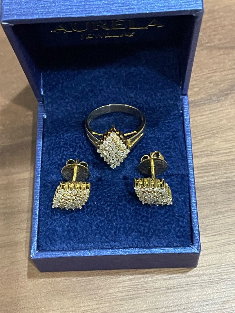 Jewelry Gold Ring and Earring Set with natural diamonds (Category: Luxury Accessories) located in Quezon City. Submitted by yenggaytot76 (Listing ID 1467101561, Image 1). Description: - Brand: Miladay - Set Includes: 1 matching ring and 2 stud earrings - Color: Yellow Gold tone - Design: Diamond-shaped clusters with pave-set crystals - Packaging: Original Miladay yellow box - Perfect for: Daily elegance, parties, or gifting.