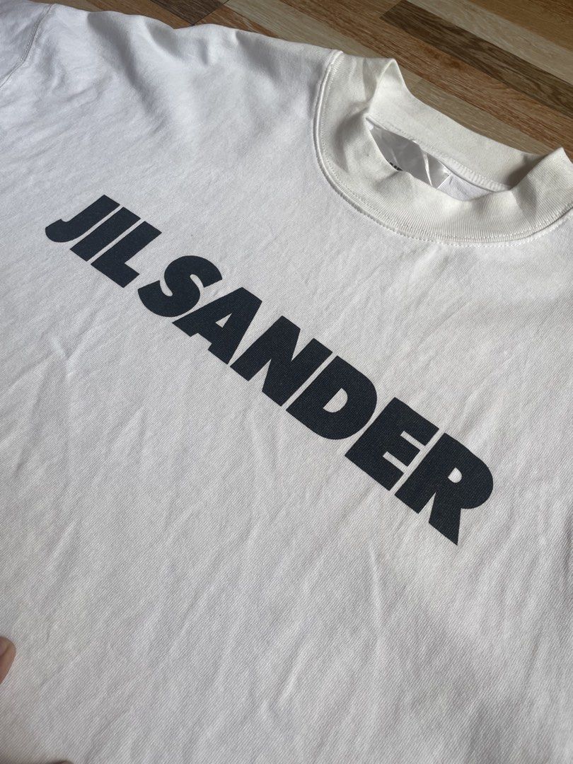 JIL SANDER (Category: Tshirts & Polo Shirts ) located in Norala. Submitted by sammythrift (Listing ID 1467016527, Image 2). Description: EXCELLENT CONDITION 9.8/10 SMALL (23x28) NO ISSUE NEED WASH.