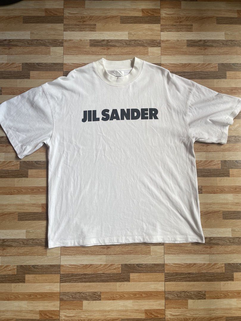 JIL SANDER (Category: Tshirts & Polo Shirts ) located in Norala. Submitted by sammythrift (Listing ID 1467016527, Image 1). Description: EXCELLENT CONDITION 9.8/10 SMALL (23x28) NO ISSUE NEED WASH.