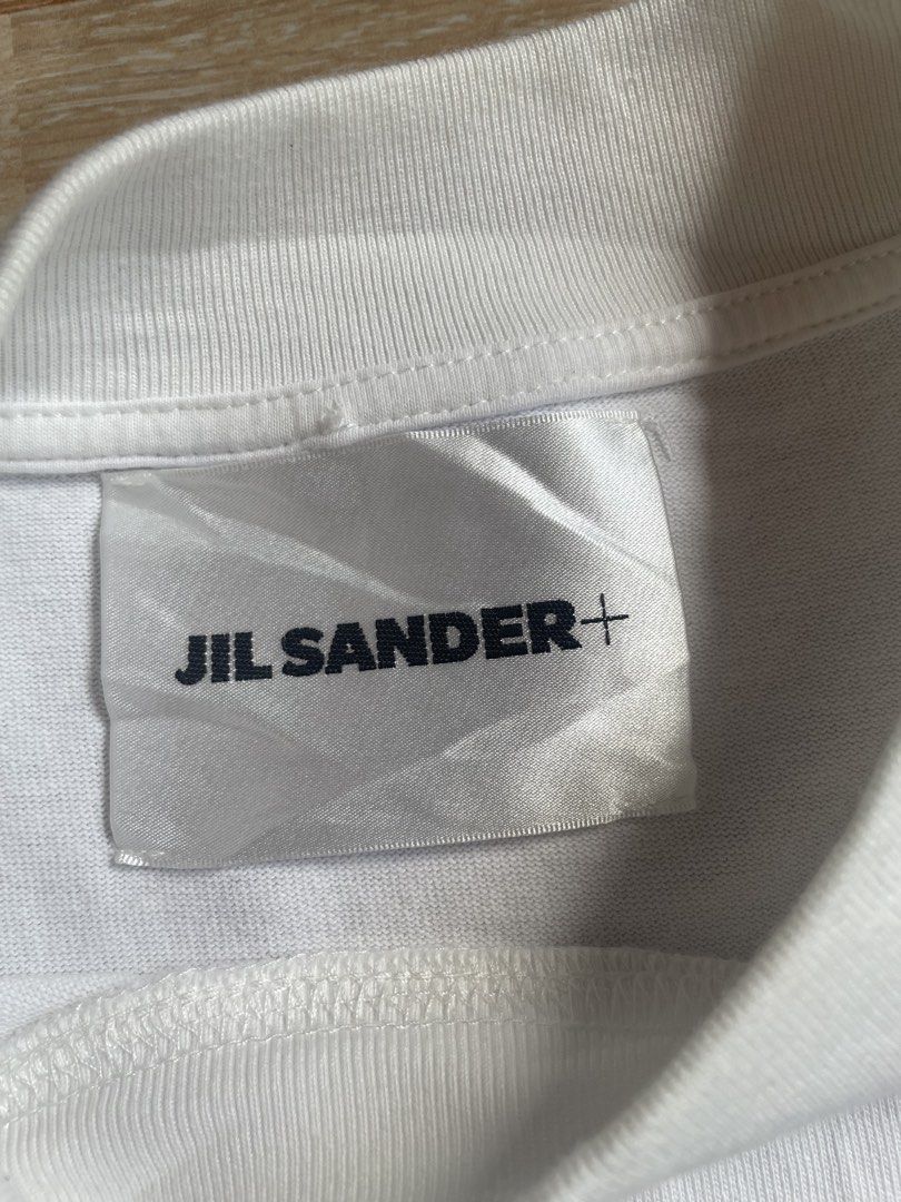 JIL SANDER (Category: Tshirts & Polo Shirts ) located in Norala. Submitted by sammythrift (Listing ID 1467016527, Image 3). Description: EXCELLENT CONDITION 9.8/10 SMALL (23x28) NO ISSUE NEED WASH.