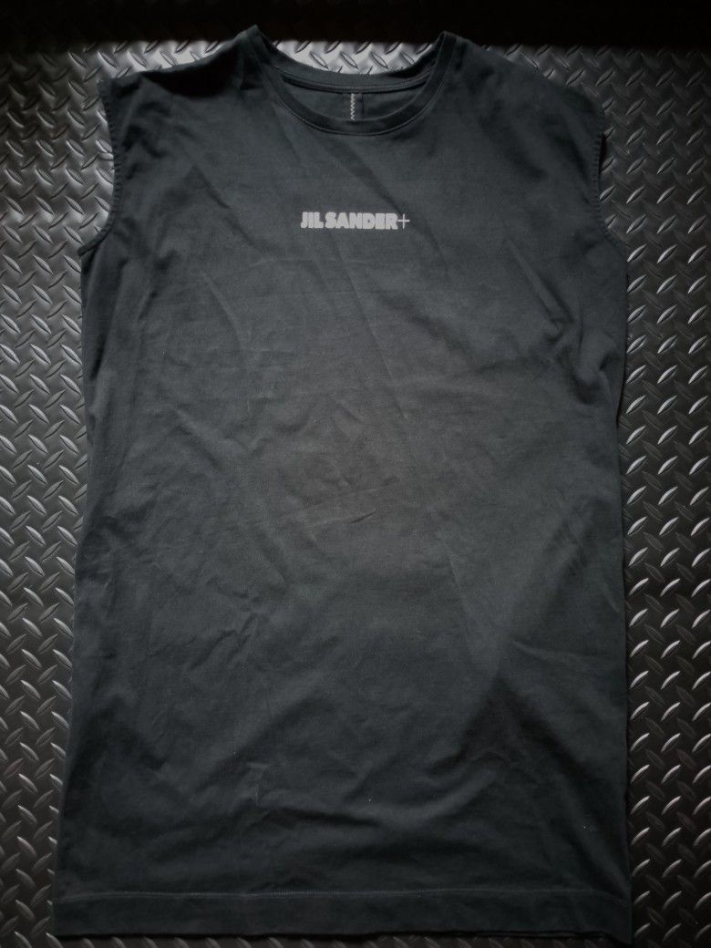 Jil Sander Long Tank Top (Category: Others Tops) located in Baguio. Submitted by bado.feels (Listing ID 1467146217, Image 1). Description: Authentic Heavy Cotton Excellent condition With 2 pockets Size Medium on tag can fit to L to XL Width 20 Length 32 1350+sf.
