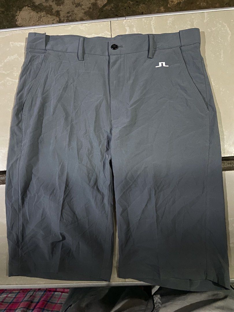 j.lindeberg Grey Golf Shorts Size 32 (Category: Shorts) located in Manila. Submitted by kentjohnz. (Listing ID 1467143005, Image 1). Description: - Brand: J.Lindeberg - Size: 32 - Color: Grey - Material: Rayon, polyester, and polyurethane blend - Features: Two front pockets, two buttoned back pockets, belt loops, and front button closure - Branding: White bridge logo near the front pocket and back right pocket 32x21 .
