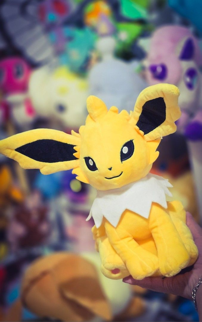 Jolteon Pokemon Plush Toy (Category: Plushies & Soft Toys) located in Paranaque City. Submitted by vanchris84 (Listing ID 1463266934, Image 2). Description: - Cute yellow Jolteon plush - Approximately 8 inches tall - Ideal for any Pokemon fan - Perfect for display or cuddling - Ready to find a new home.
