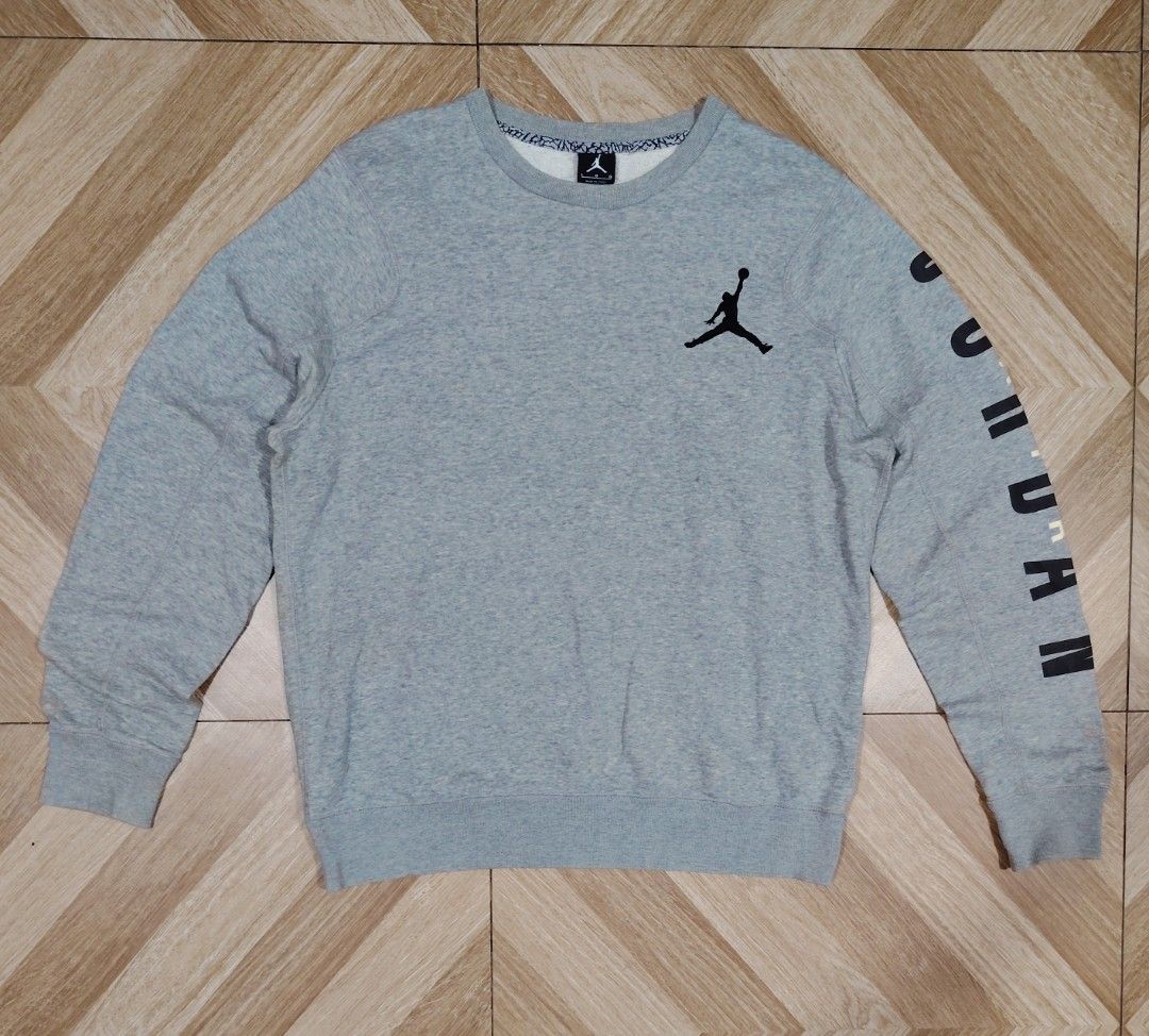 Jordan Light Gray Crewneck Men's Sweater (Category: Coats, Jackets and Outerwear) located in Marikina City. Submitted by kingdrel (Listing ID 1467099712, Image 1). Description: Jordan Light Gray Crewneck Men's Sweater ( EMBROIDERED JUMPMAN LOGO ) W 23 L 27 VERYGOOD CONDITION NO ISSUE COLORATE 9.5-10.