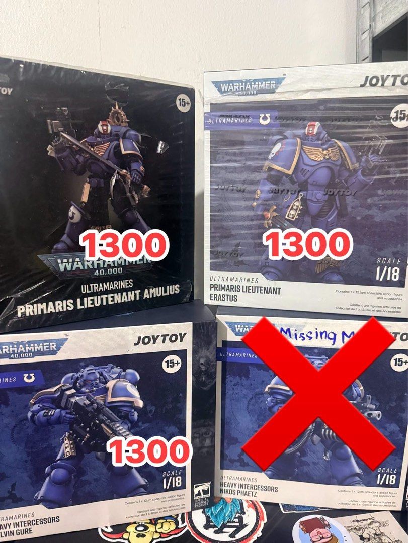 JoyToy Warhammer 40k Ultramarines Action Figures (Category: Figurines & Statues) located in San Juan City. Submitted by mangdibsnation (Listing ID 1467160318, Image 2). Description: JoyToy Warhammer 40k action figures available. Ultramarines and Space Wolves models. 1/18 scale collectibles. Various characters including captains, lieutenants, and intercessors. Pricing ranges from 1200 to 1400 per figure. Some boxes have minor notes written on them