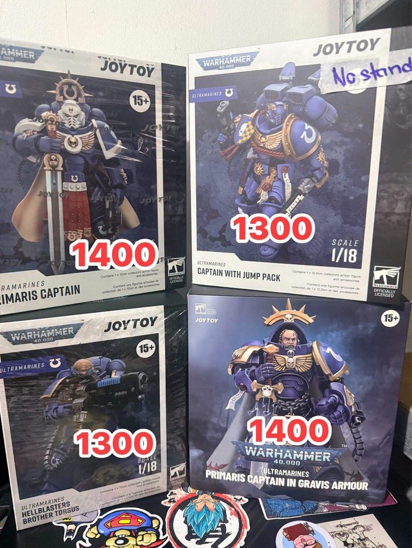 JoyToy Warhammer 40k Ultramarines Action Figures (Category: Figurines & Statues) located in San Juan City. Submitted by mangdibsnation (Listing ID 1467160318, Image 1). Description: JoyToy Warhammer 40k action figures available. Ultramarines and Space Wolves models. 1/18 scale collectibles. Various characters including captains, lieutenants, and intercessors. Pricing ranges from 1200 to 1400 per figure. Some boxes have minor notes written on them