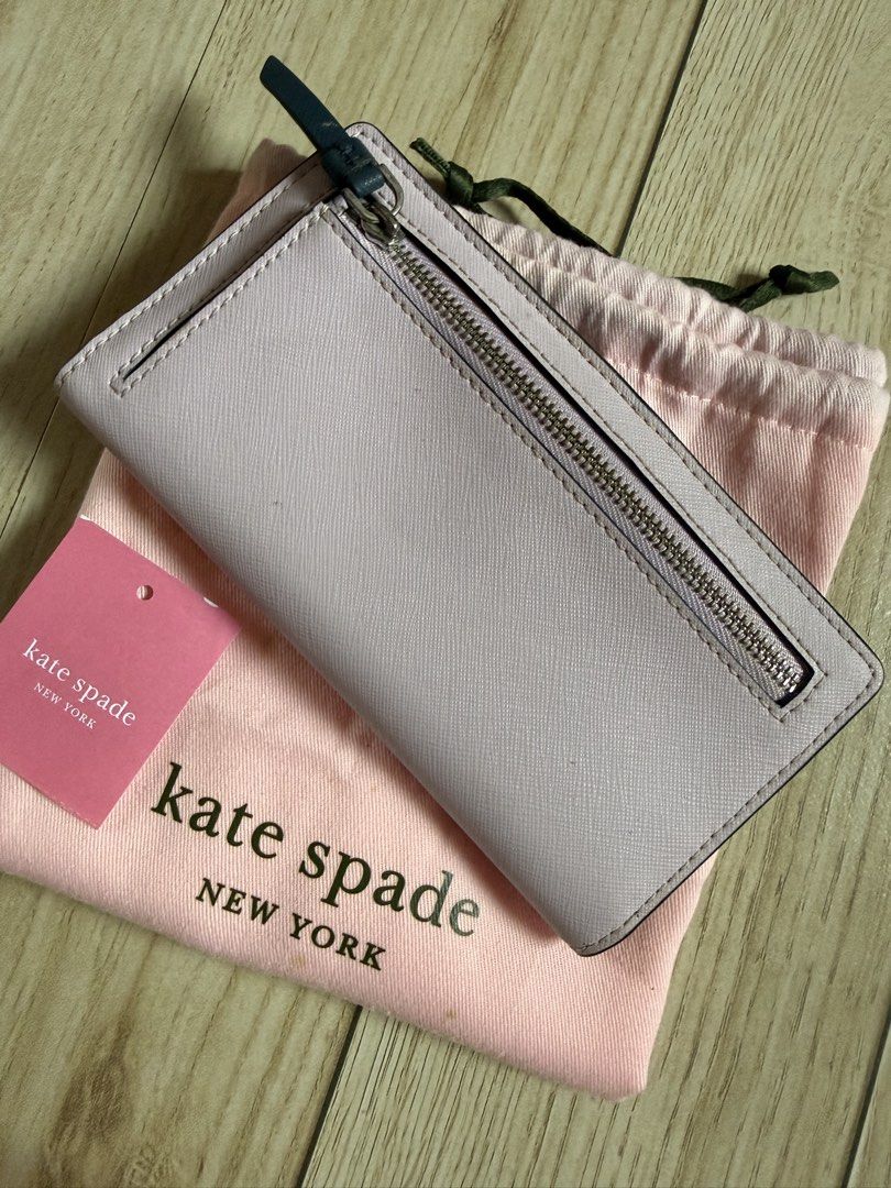 Kate Spade ♠️ (Category: Luxury Bags & Wallets) located in Manila. Submitted by mariadarna (Listing ID 1467161457, Image 2). Description: Authentic Kate Spade wallet bought in US sign of usage .