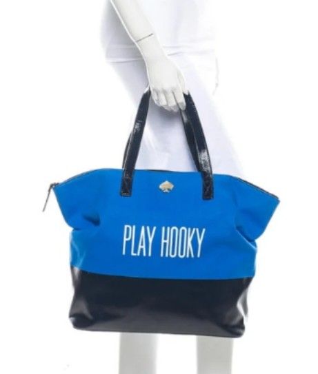 Kate Spade PLAY HOOKY XL TOTEBAG (Category: Luxury Bags & Wallets) located in Manila. Submitted by eriiicaspage (Listing ID 1467038887, Image 3). Description: PREOWNED Lightly Used Authentic Kate Spade Canvas Leather XL totebag - Color/Design: Navy blue and white canvas with 'PLAY HOOKY' print - Straps: Navy blue leather, - Hardware: Signature spade on top center - Closure: Top zip - Interior: Tan and white striped lining with 1 zippered pocket S