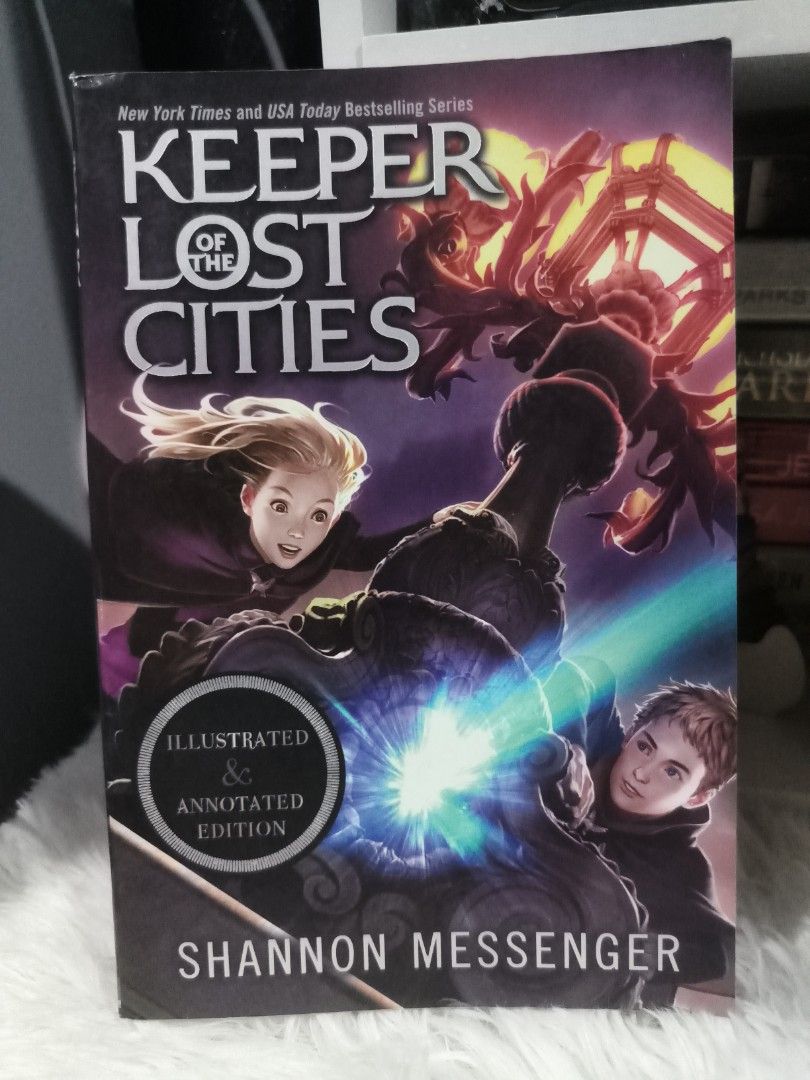 Keeper of the Lost Cities Illustrated & Annotated Edition (Category: Storybooks) located in Cabuyao City. Submitted by chaptersandwonders143 (Listing ID 1467016069, Image 1). Description: Large paperback - Title: Keeper of the Lost Cities Illustrated and Annotated Edition - Author: Shannon Messenger - Format: Paperback - Special Features: Includes exclusive deleted scenes - Condition: Spine has creases from reading; pages contain handwritten note
