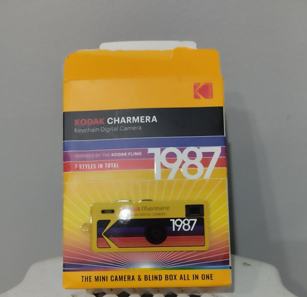 Kodak Charmera Keychain Digital Camera 1987 Edition (Category: Cameras) located in Subic. Submitted by starvi (Listing ID 1467123409, Image 1). Description: - Model: Kodak Charmera keychain digital camera (1987 edition inspired by the Kodak Fling) - Design: Super compact mini camera and blind box collectable - Features: Fun retro accessory for quick, casual snaps - Inclusions: Main camera unit, charging cable, sticker sheet, and instruction manua