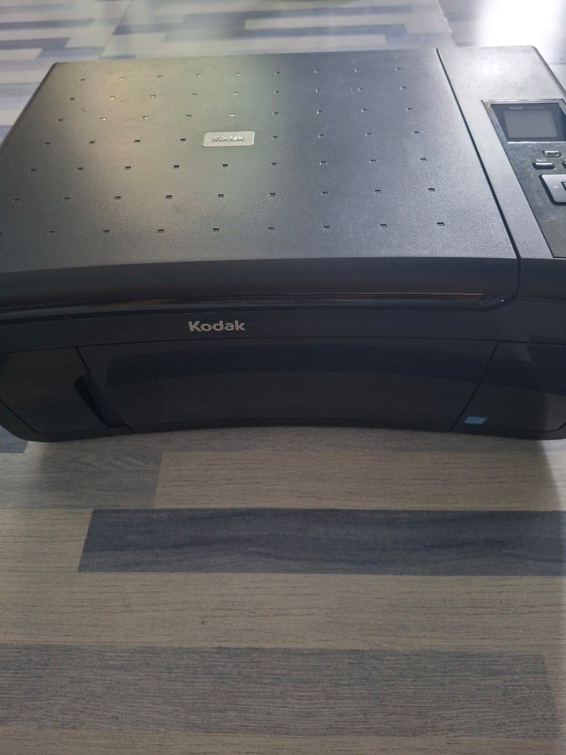Kodak ESP 3250 All-in-One Printer (Category: Printers, Scanners & Copiers) located in Manila. Submitted by ninyagauri24333 (Listing ID 1467010624, Image 2). Description: - Model: Kodak ESP 3250 All-in-One Printer (Black) - Condition: Powers up and working well, ideal for daily home office document needs - Features: Built-in display screen and convenient top-panel control buttons - Design: Compact setup with standard paper loading - Inclusions: Un