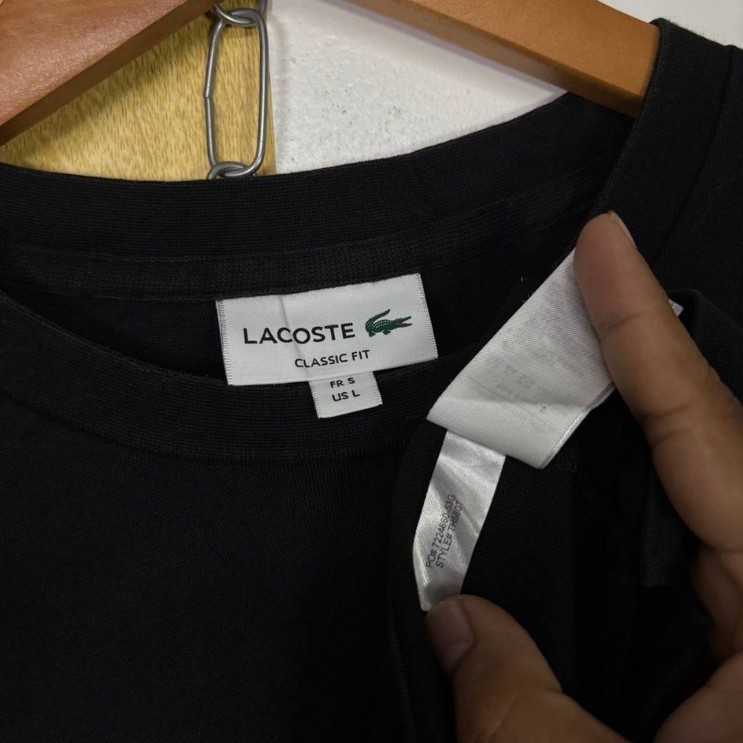 LACOSTE (Category: Luxury Apparel) located in Manila. Submitted by hiddengems1602 (Listing ID 1467134396, Image 3). Description: Size L on tag Dimensions: 21x28 Color Rate: 9.5/10 Excellent Condition Issue: None.