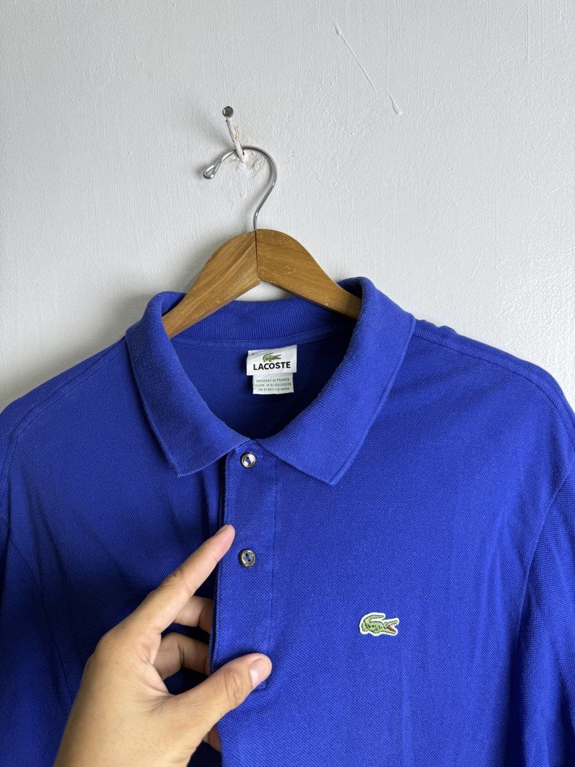 Lacoste blue polo shirt (Category: Tshirts & Polo Shirts ) located in Daraga. Submitted by mirandillaadrian (Listing ID 1467117554, Image 2). Description: Authentic Issue minimal fold line ww not visible Solid pa 9.5/10 23x30.