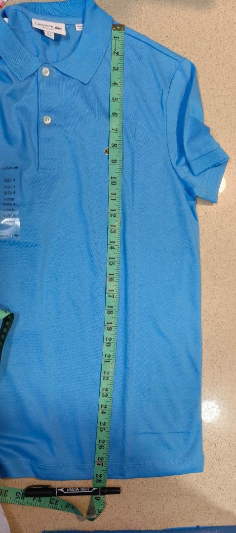 Lacoste Blue Polo Shirt Size 4 Medium (Category: Tshirts & Polo Shirts ) located in Zamboanga. Submitted by benbryanab14320 (Listing ID 1467157147, Image 2). Description: - Brand: Lacoste - Color: Bright Blue - Size: 4 / Medium (Regular Fit) - Condition: Brand new with original tags - Details: Classic collar, 2-button placket, iconic embroidered green crocodile logo - Style: Clean, classic casual wear -Authentic -Way below srp.