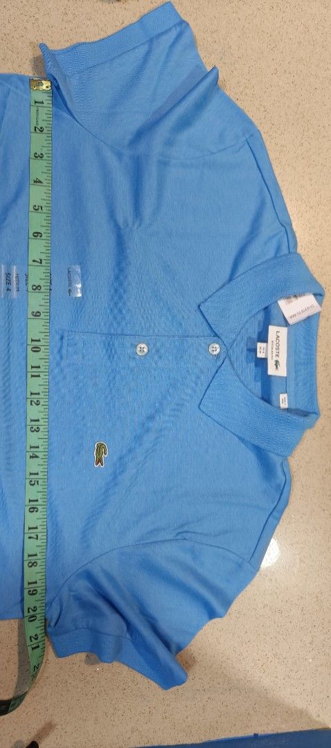 Lacoste Blue Polo Shirt Size 4 Medium (Category: Tshirts & Polo Shirts ) located in Zamboanga. Submitted by benbryanab14320 (Listing ID 1467157147, Image 1). Description: - Brand: Lacoste - Color: Bright Blue - Size: 4 / Medium (Regular Fit) - Condition: Brand new with original tags - Details: Classic collar, 2-button placket, iconic embroidered green crocodile logo - Style: Clean, classic casual wear -Authentic -Way below srp.