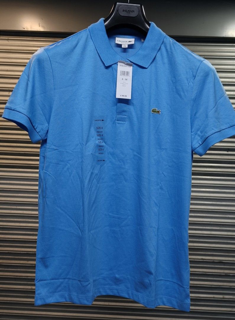 Lacoste Blue Polo Shirt Size 4 Medium (Category: Tshirts & Polo Shirts ) located in Zamboanga. Submitted by benbryanab14320 (Listing ID 1467157147, Image 3). Description: - Brand: Lacoste - Color: Bright Blue - Size: 4 / Medium (Regular Fit) - Condition: Brand new with original tags - Details: Classic collar, 2-button placket, iconic embroidered green crocodile logo - Style: Clean, classic casual wear -Authentic -Way below srp.