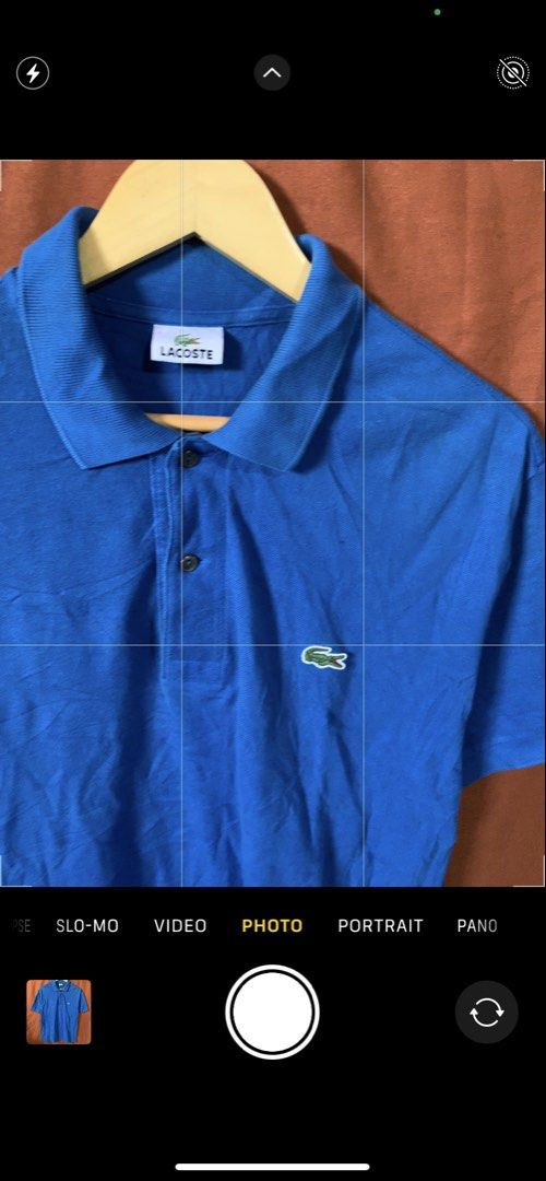 Lacoste Blue Polo Shirt Size 5 (Category: Tshirts & Polo Shirts ) located in Davao. Submitted by cheineebau09680 (Listing ID 1466990005, Image 2). Description: - Brand: Lacoste - Color: Solid Blue - Size: 5 - Material: 100% Cotton - Details: Classic two-button placket, ribbed collar, and cuffs - Logo: Iconic embroidered green crocodile on left chest - Condition: Excellent, ready to wear.