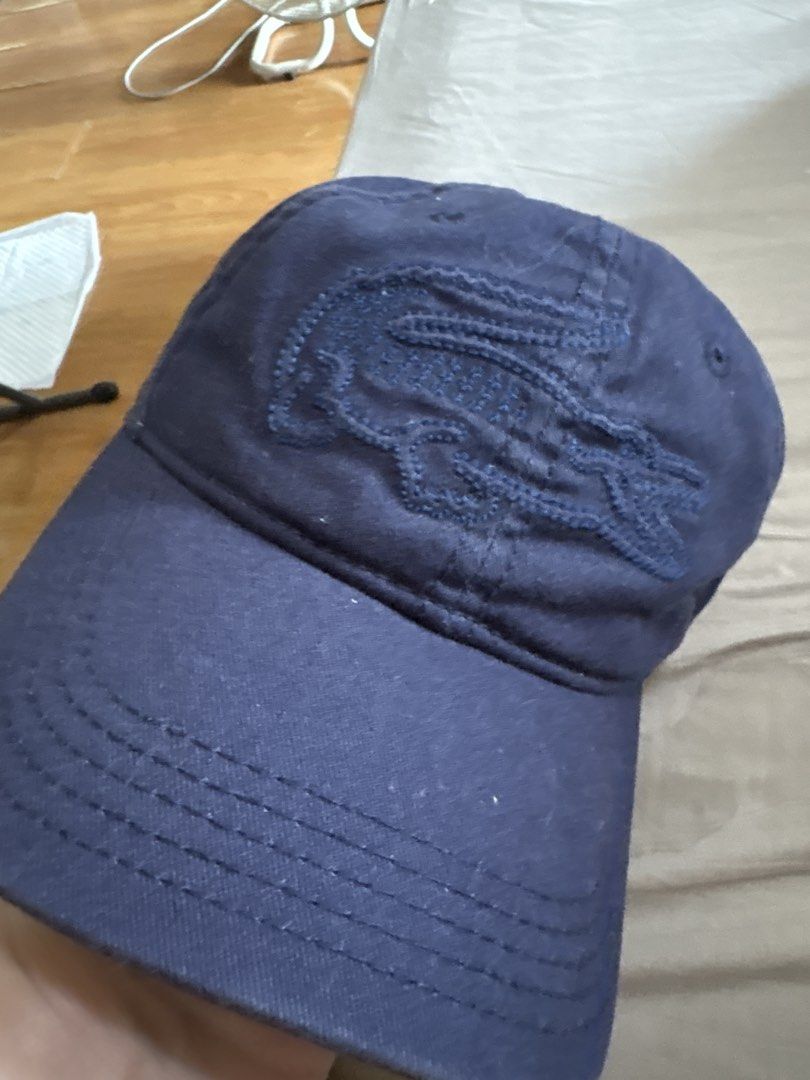 Lacoste cap (Category: Hats & Beanies) located in Binan City. Submitted by dabiescloset (Listing ID 1467017913, Image 1). Description: Rfs decluttering. Color navy blue. .