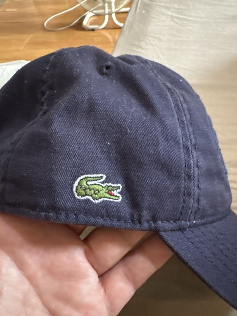 Lacoste cap (Category: Hats & Beanies) located in Binan City. Submitted by dabiescloset (Listing ID 1467017913, Image 2). Description: Rfs decluttering. Color navy blue. .