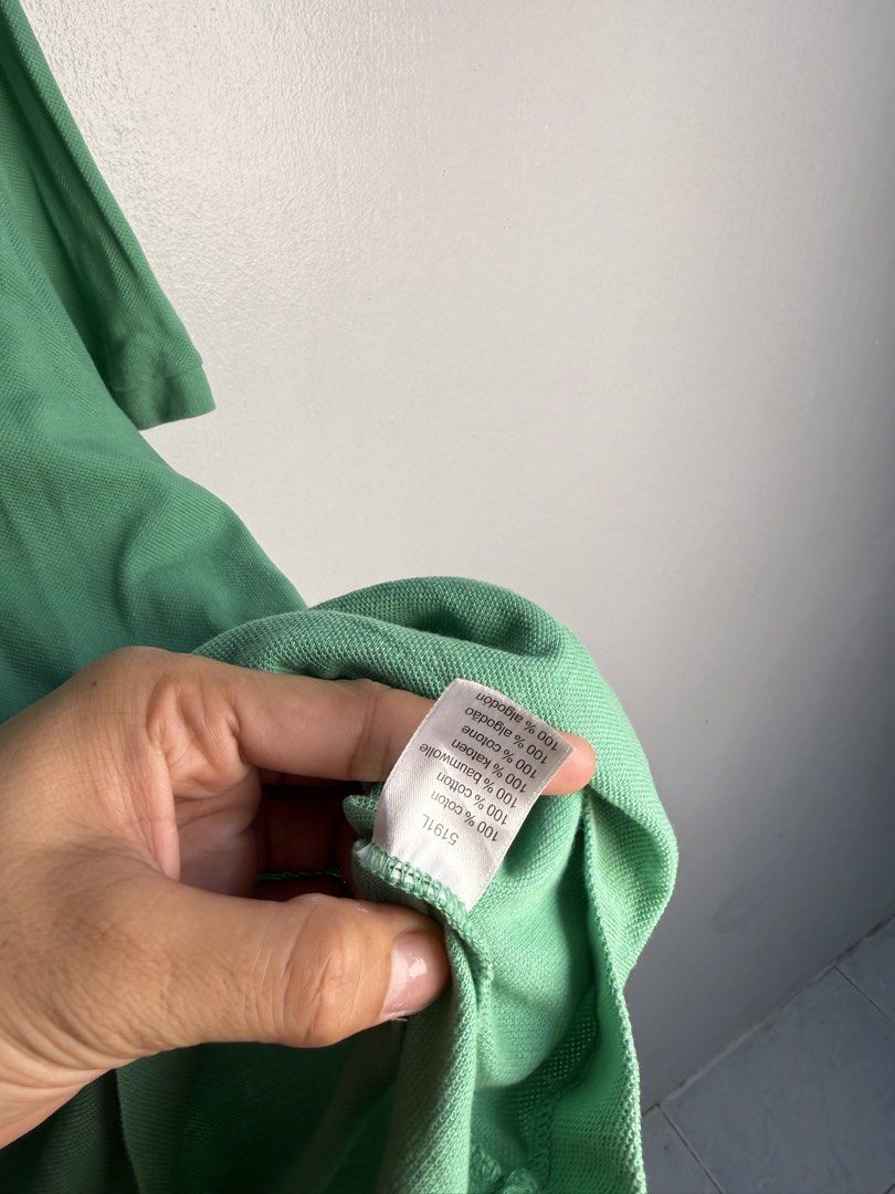 Lacoste green polo shirt (Category: Tshirts & Polo Shirts ) located in Daraga. Submitted by mirandillaadrian (Listing ID 1467118907, Image 3). Description: Authentic Minimal stain last pic 22x29 large 9.5/10 fair color .