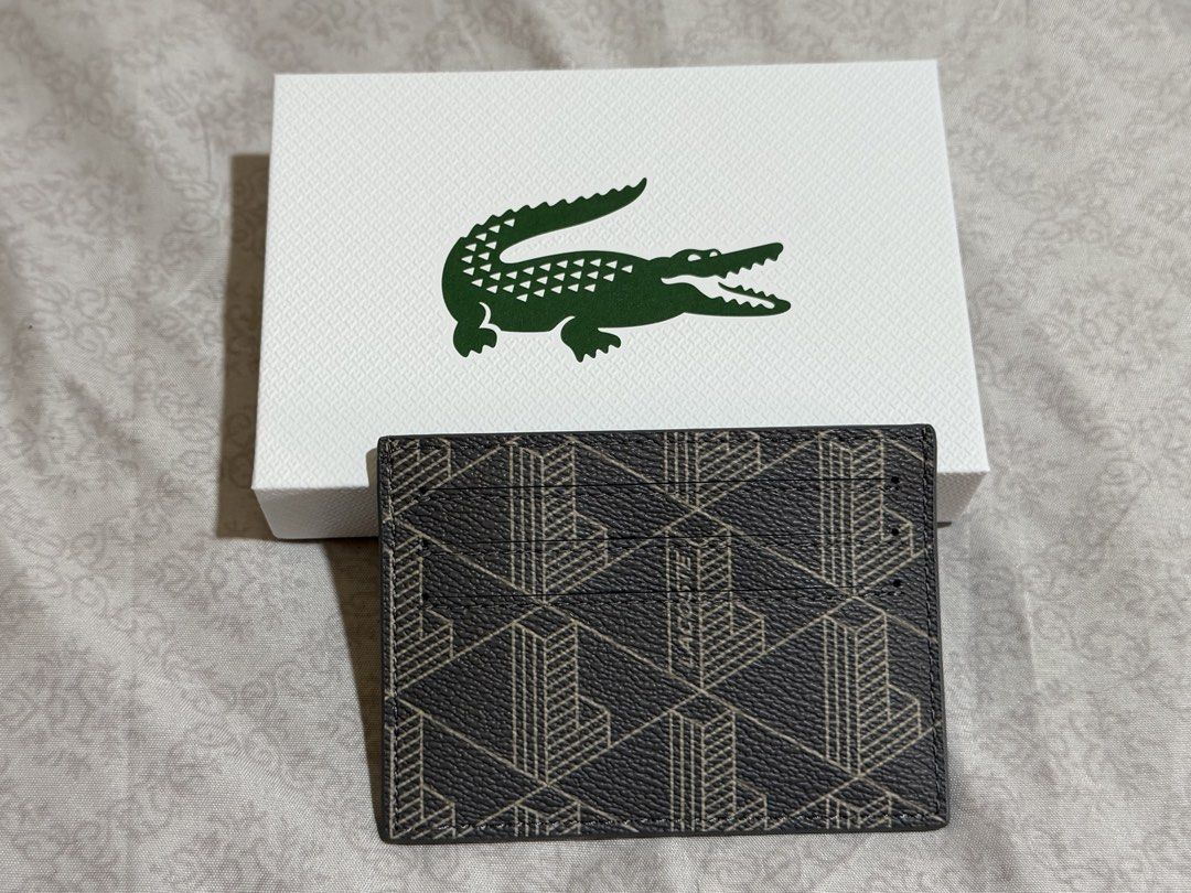 Lacoste Monogram Castlerock String Card Holder (Category: Luxury Bags & Wallets) located in Antipolo. Submitted by nyeahsells (Listing ID 1466997305, Image 2). Description: Brand: Lacoste Condition: ORIGINAL, BRAND NEW & UNUSED RFS: Extra Disclaimer: - All sales final (NO RETURN, NO EXCHANGE) - Our shop will not be liable for any damages due to mishandling by the courier - Please manage expectations - First to pay gets the item (NO RESERVATIONS) 