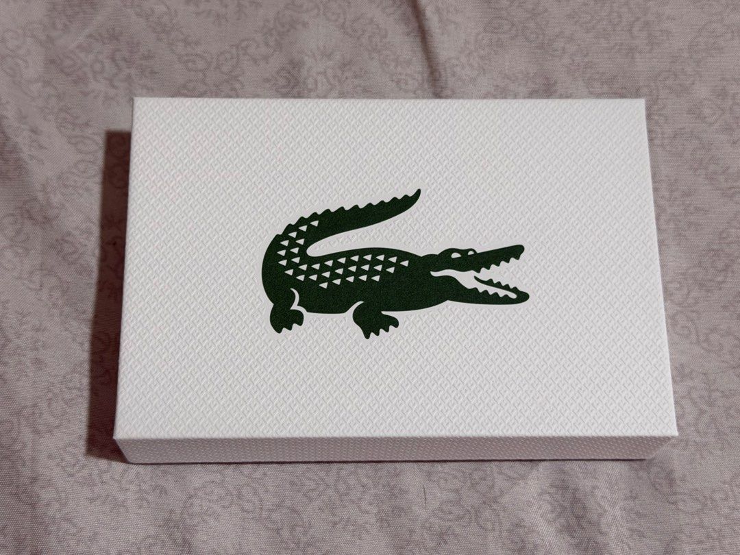 Lacoste Monogram Castlerock String Card Holder (Category: Luxury Bags & Wallets) located in Antipolo. Submitted by nyeahsells (Listing ID 1466997305, Image 3). Description: Brand: Lacoste Condition: ORIGINAL, BRAND NEW & UNUSED RFS: Extra Disclaimer: - All sales final (NO RETURN, NO EXCHANGE) - Our shop will not be liable for any damages due to mishandling by the courier - Please manage expectations - First to pay gets the item (NO RESERVATIONS) 
