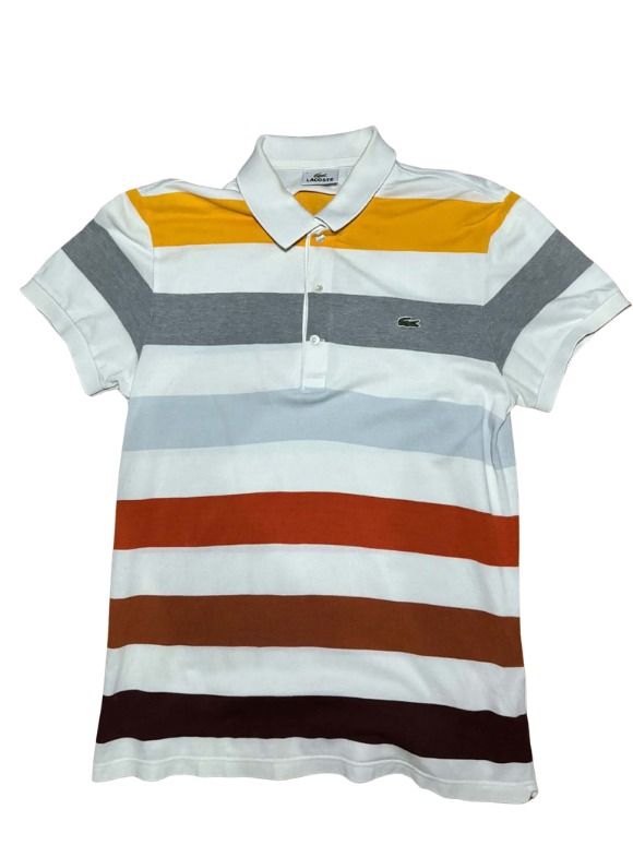 Lacoste Multi-Color Striped Polo Shirt (Category: Tshirts & Polo Shirts ) located in Marikina City. Submitted by maobuysstuff (Listing ID 1467012814, Image 1). Description: Lacoste Multi-Color Striped Polo Shirt - Style: Horizontal striped polo shirt (white, yellow, grey, light blue, rust orange) - Fits Small-Medium - 18" x 27" - Details: White ribbed collar, 3 mother-of-pearl buttons, iconic embroidered green crocodile logo - Flaw: Slight yellow