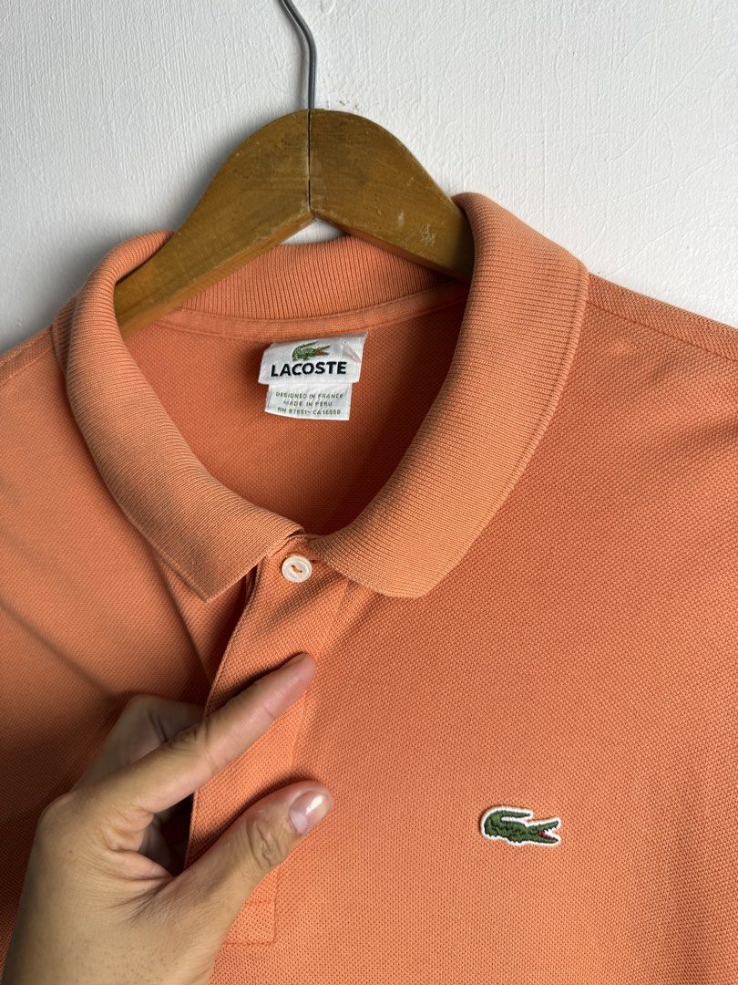 Lacoste orange polo shirt (Category: Tshirts & Polo Shirts ) located in Daraga. Submitted by casualthread (Listing ID 1467125934, Image 3). Description: Authentic No issue 9/10 fair color 24x29.