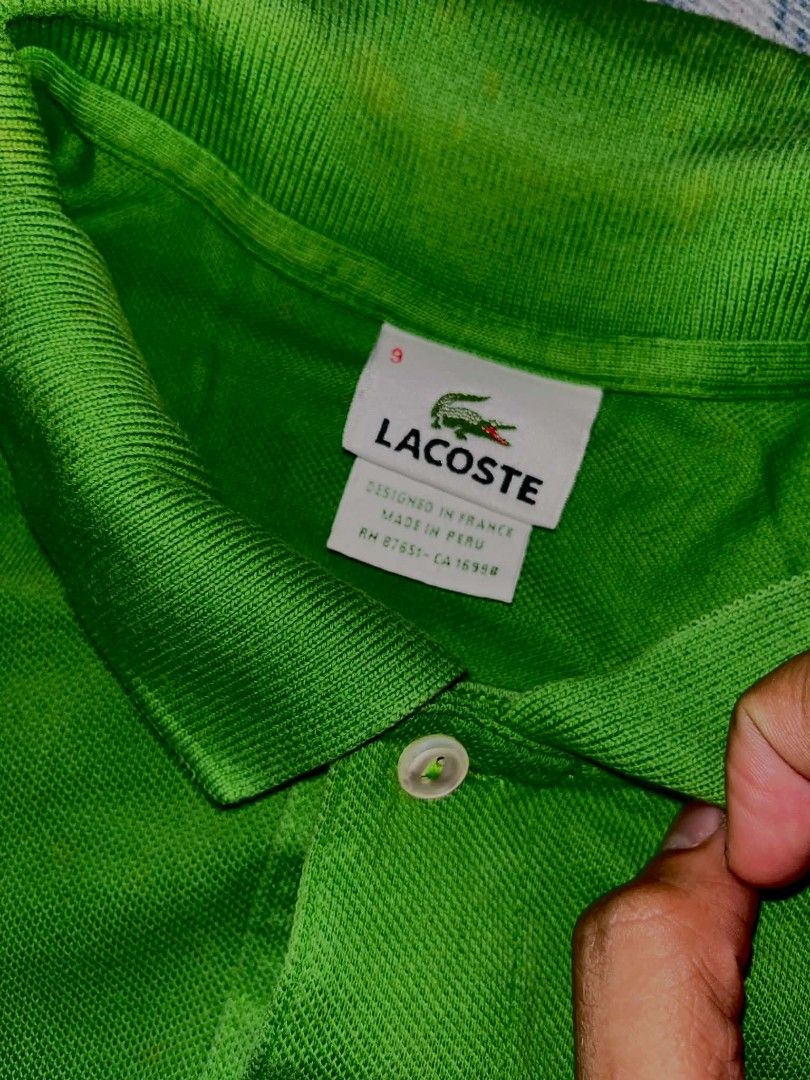 Authentic Lacoste Polo Shirt Lime Green Blue Bundle 550 (Category: Tshirts & Polo Shirts ) located in Bacoor. Submitted by luckyjohnsel (Listing ID 1467103798, Image 3). Description: - Set of 2 Lacoste polo shirts (Lime Green and Blue) - Size: 9 on tag - Material: Classic pique cotton fabric - Features: Button placket and iconic embroidered crocodile logo on the chest - Origin: Designed in France, made in Peru - Condition: Great casual staples re