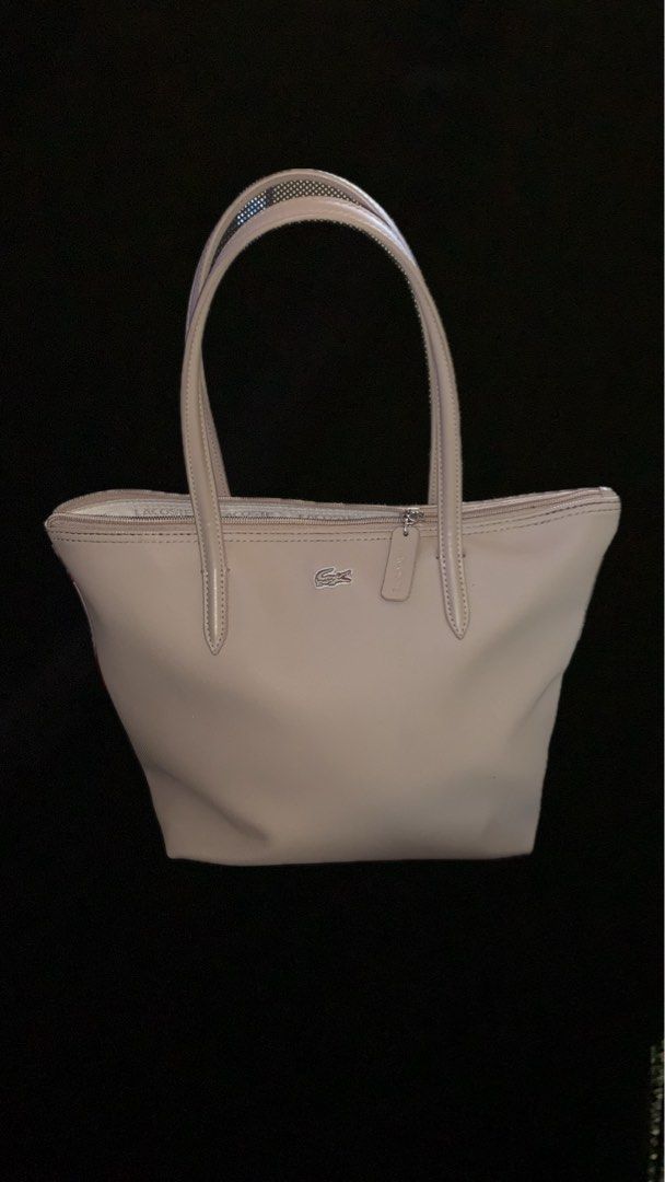 Lacoste Small Tote Bag (Category: Tote Bags) located in Manila. Submitted by kuuurooomiii (Listing ID 1467033386, Image 1). Description: - Brand: Lacoste (Authentic) - Classic Beige pm for more deets. .