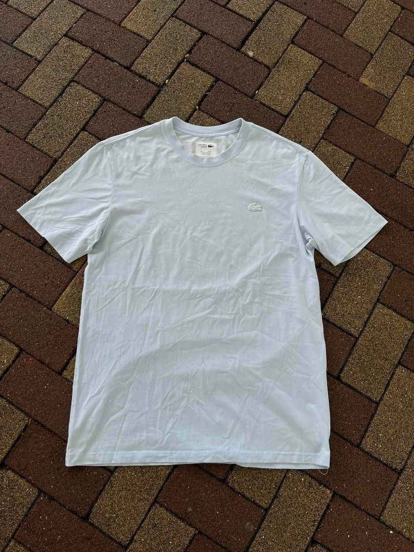 Lacoste Sports (Category: Activewear) located in Davao. Submitted by thriftnijanny (Listing ID 1467157242, Image 1). Description: 📌Lacoste Sports size XXL 21x30 Good Condi Color rate: 9/10 issue: Small Yellow stain on neck part, back and front Check CS for pics.