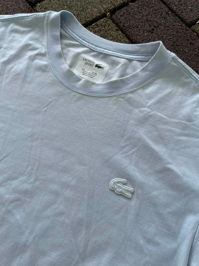 Lacoste Sports (Category: Activewear) located in Davao. Submitted by thriftnijanny (Listing ID 1467157242, Image 2). Description: 📌Lacoste Sports size XXL 21x30 Good Condi Color rate: 9/10 issue: Small Yellow stain on neck part, back and front Check CS for pics.