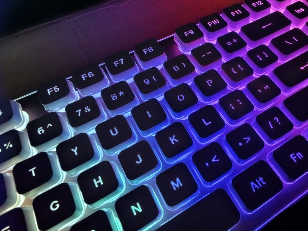 LANGTU L1 Tri-Mode Mechanical Membrane Keyboard Pink (Category: Computer Keyboard) located in Imus. Submitted by jamillabrillantes (Listing ID 1466988123, Image 3). Description: - Model: LANGTU L1 Tri-Mode Membrane Keyboard (Pink) - Connectivity: Wireless and wired options with dual-system support - Lighting: Vibrant RGB backlit keys with multi-color effects - Ergonomics: 15-degree inclined typing angle for comfortable work and gaming - Inclusion