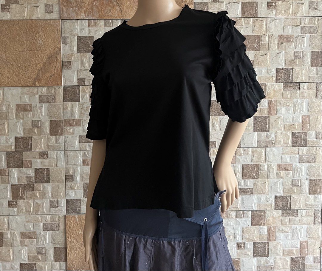 LANVIN - “ RUFFED “ DESIGN TSHIRT (Category: Blouses) located in Bacolod City. Submitted by timelessbyjosh (Listing ID 1467057944, Image 1). Description: BEST FOR CASUAL OUTFITS SIZE : 38 ACTUAL COLOR : BLACK COLOR RATE : 10 OUT OF 10 CONDITION : NEAR NEW MATERIAL : 100 % COTTON MADE IN : FLAWS : NONE DIMENSIONS LENGTH - 22. 5 WIDTH - 18 MEASUREMENT TAKEN WHILE LAYING FLAT. PLEASE COMPARE THE MEASUREMENT WITH YOUR GARMENT. .