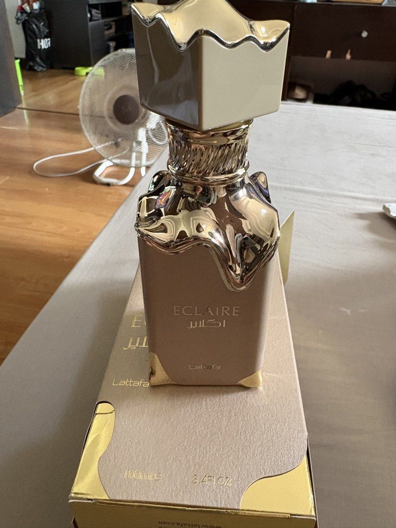 Lattafa Eclaire perfume (Category: Other Accessories) located in Binan City. Submitted by dabiescloset (Listing ID 1467007438, Image 2). Description: RFS was given as a gift not a fan of caramel vanilla scent. Just open and tested the scent. .