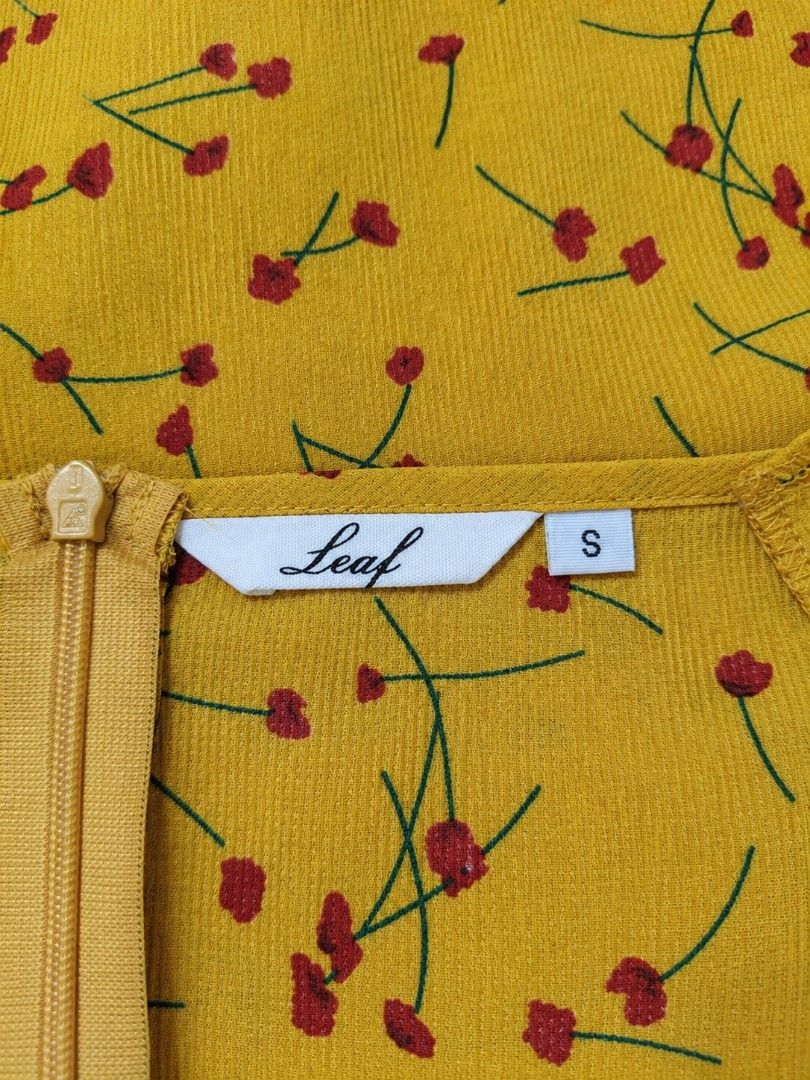 Leaf Floral Yellow Mini Dress (Category: Dresses) located in Manila. Submitted by maxinesotto (Listing ID 1467087151, Image 3). Description: SIZE: bust - 15 waistline - 27 length - 31.