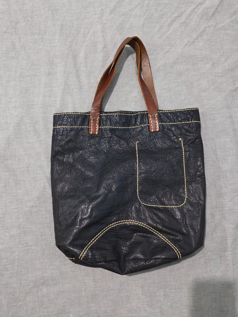 Leather works tote bag (Category: Sling Bags) located in Baguio. Submitted by used_clothing2600 (Listing ID 1466980027, Image 1). Description: Leather works tote bag verygood condition signs of usage P 1,200.