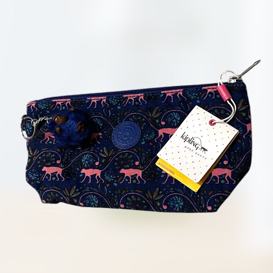 LEGIT KIPLING with TAGS Jungle Monkey Print Pouch Wallet Carryall Case (Category: Purses & Pouches) located in Pasig City. Submitted by funhuntr (Listing ID 1467038911, Image 3). Description: AUTHENTIC LEGIT Kipling Pink monkey jungle pattern on dark blue Pouch with Keychain and tags - Condition: Brand new with original store tags attached (Never used) - Features: Secure top zip closure, spacious interior for stationery, small accessories, makeup