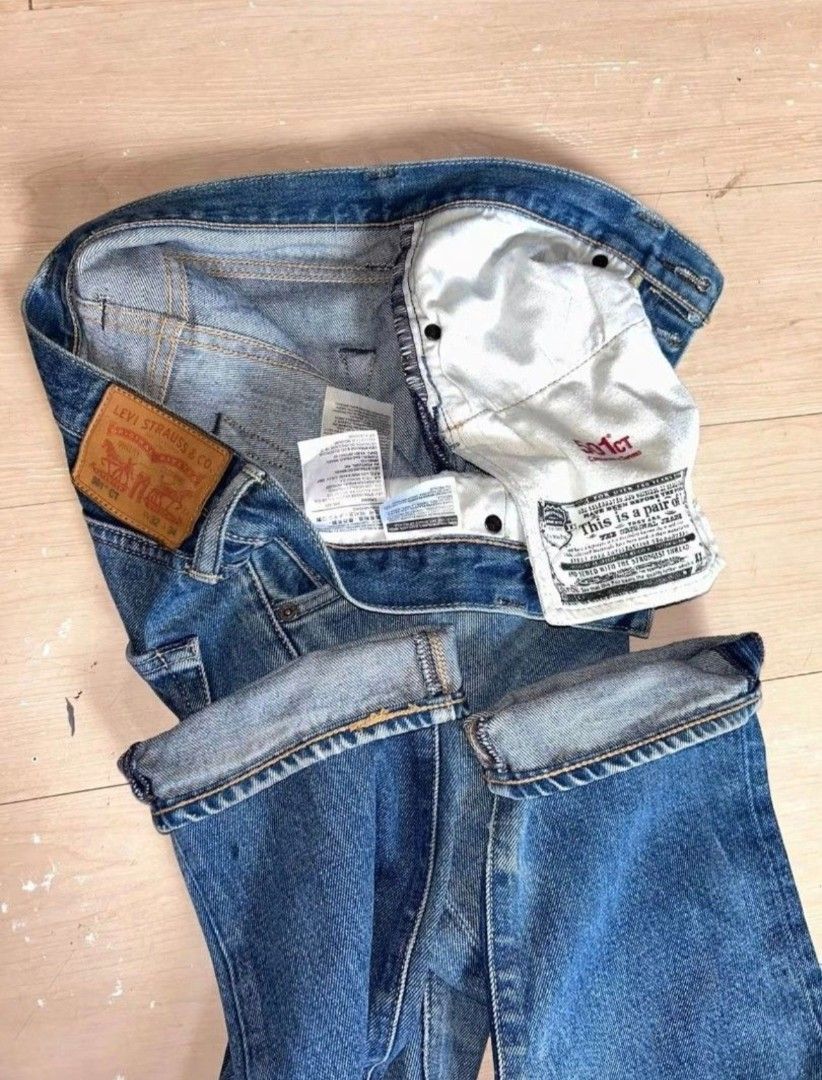 Levi's 501 CT Customized & Tapered Jeans (Category: Jeans) located in Calbayog City. Submitted by thrift.bucks101 (Listing ID 1467087940, Image 1). Description: - Brand: Levi's 501 CT (Customized & Tapered) - Color/Wash: Medium blue with natural fading and whiskering - Closure: Classic button fly - Details: Leather back patch and signature pocket prints inside - Fit: Classic fit with a tapered leg for a great worn-in look - See last pic for indic