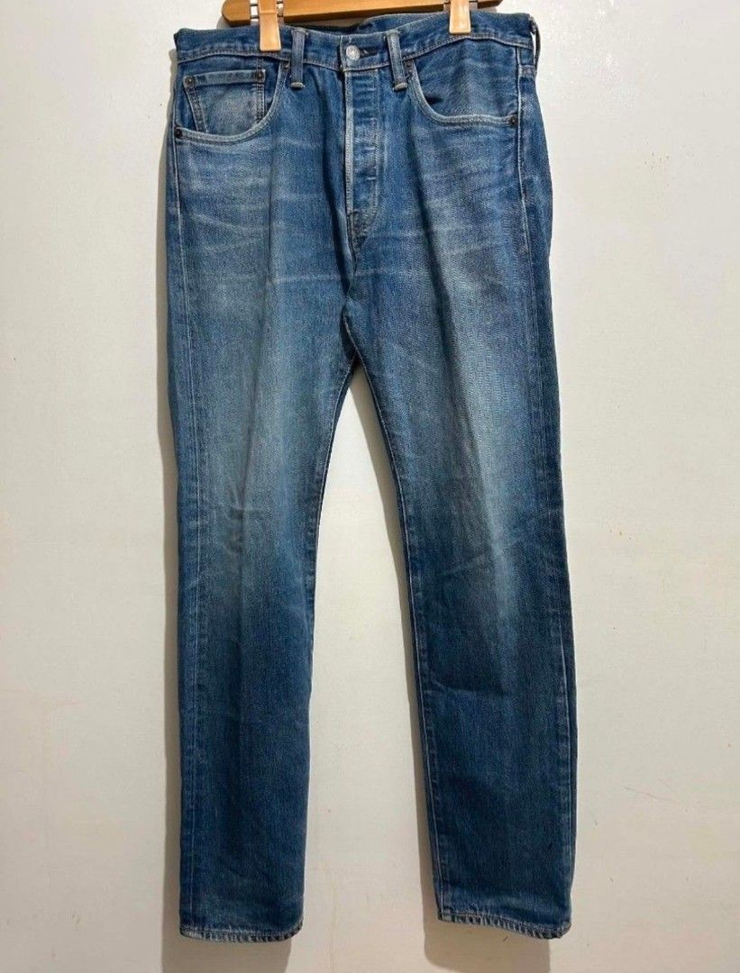 Levi's 501 CT Customized & Tapered Jeans (Category: Jeans) located in Calbayog City. Submitted by thrift.bucks101 (Listing ID 1467087940, Image 2). Description: - Brand: Levi's 501 CT (Customized & Tapered) - Color/Wash: Medium blue with natural fading and whiskering - Closure: Classic button fly - Details: Leather back patch and signature pocket prints inside - Fit: Classic fit with a tapered leg for a great worn-in look - See last pic for indic