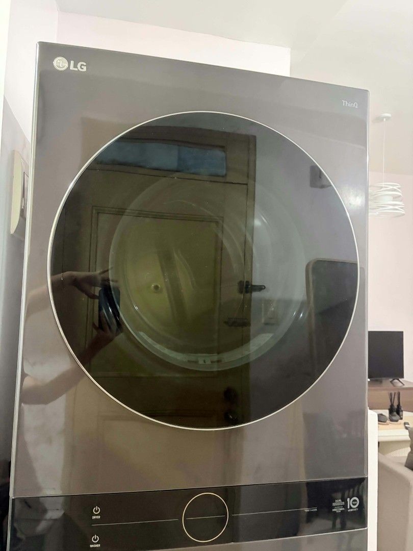 LG WT2117NHB Washer Dryer ThinQ (Category: Washing Machines and Dryers) located in Paranaque City. Submitted by smplyiale (Listing ID 1467104400, Image 2). Description: - Model: LG WT2117NHB Washer Dryer (Grey finish) - Capacity: Perfect for big laundry loads - Smart Tech: Built-in LG ThinQ - Controls: Convenient dual control panel at top and bottom - Condition: Clean drum interior and detergent drawer with normal daily wear on surfaces, works gr