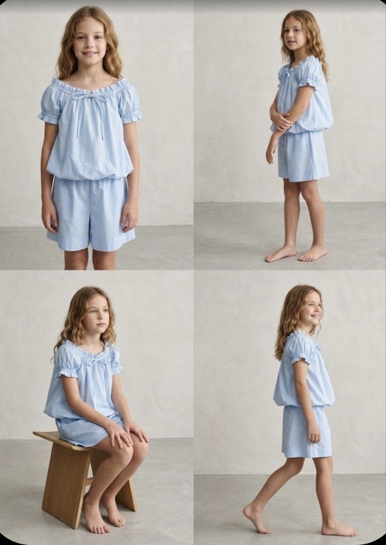 Light Blue Puffy top (Category: Babies & Kids Fashion) located in Manila. Submitted by bright.atina14 (Listing ID 1467071043, Image 2). Description: - Color: Light blue - Set includes: Loose off-shoulder top and matching shorts - Details: Thin bow strings, gathered ruffles, and short puff sleeves with elastic cuffs - Fit: Soft, comfortable fabric with a bloomer-style bubble top - Style: Great casual outfit for warm weather days.