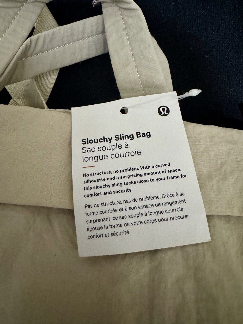 LLLemon Cross body Bag / Sling (Category: Cross-body Bags) located in Manila. Submitted by nmiamaya (Listing ID 1467115342, Image 3). Description: Lululemon Sling / Cross body Bag - Cream Color - Polyester & Nylon Material - (still with tag) - Micro 5L .